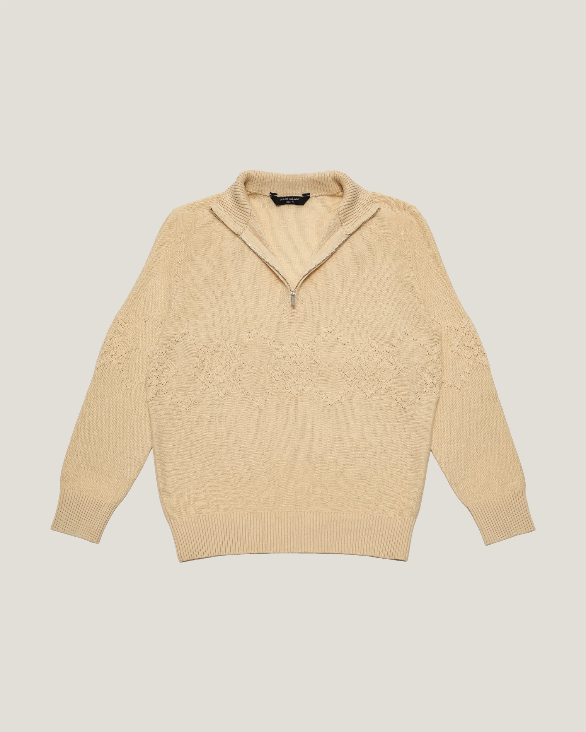(IVORY) KNITTED COTTON ARGYLE QUARTER ZIP SWEATER